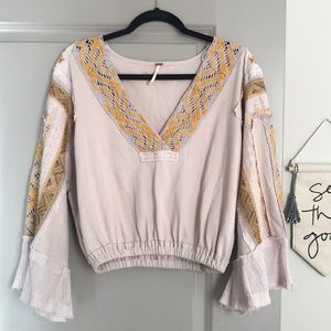 Free people size small v neck with bell sleeves